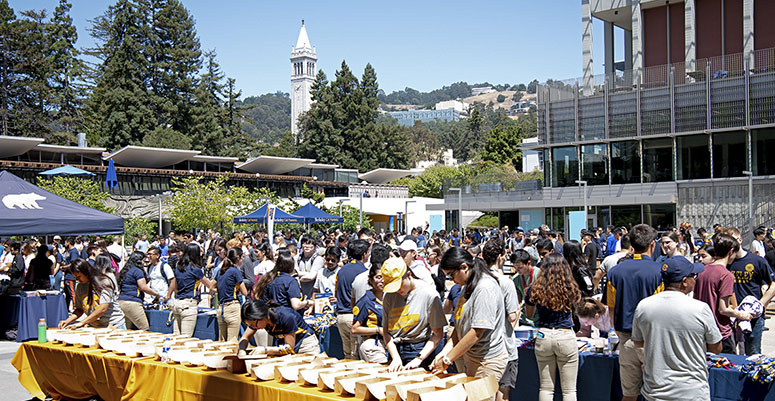 People setting up booths for GBO